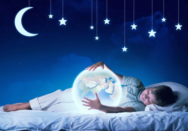 Boy dreaming before sleep — Stock Photo, Image