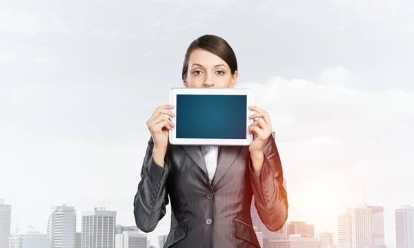 Businesswoman holding tablet computer layout — Stock Photo, Image