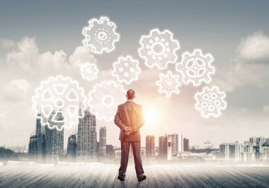 Ekip çalışması ve işbirliği sembolü olarak ekranda çarklı motor çizildi