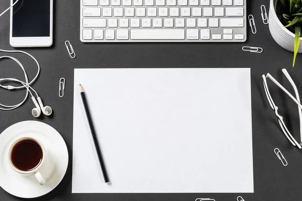 Top view of modern workplace with blank paper — Stock Photo, Image