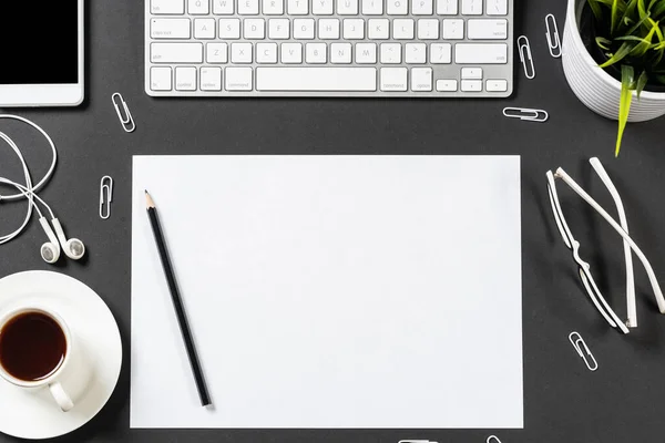 Top view of modern workplace with blank paper — Stock Photo, Image