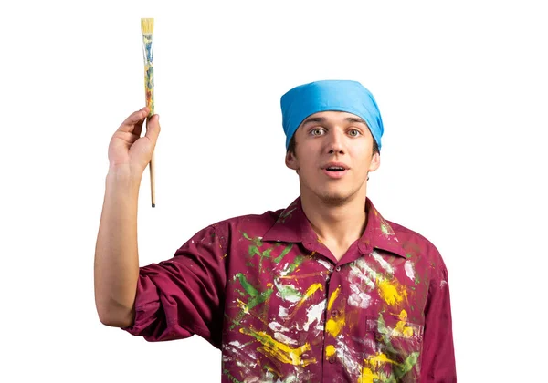 Young painter artist pointing upwards — Stock Photo, Image