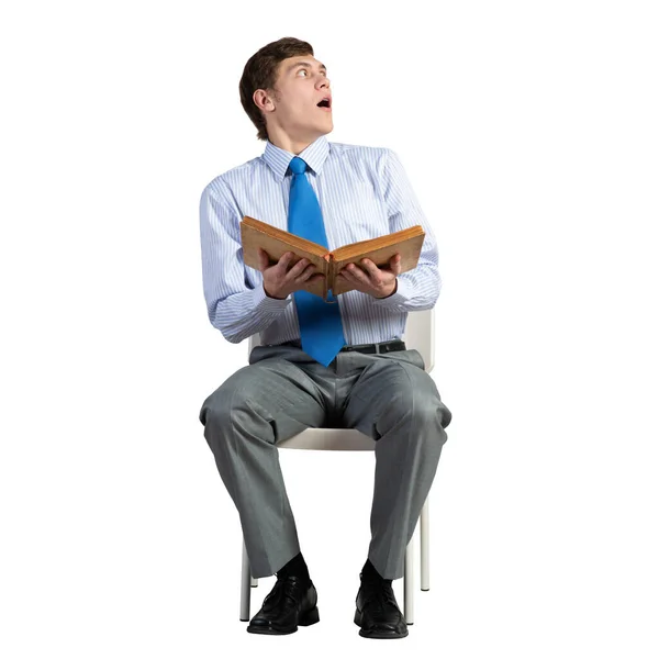 Young businessman with a book — Stock Photo, Image