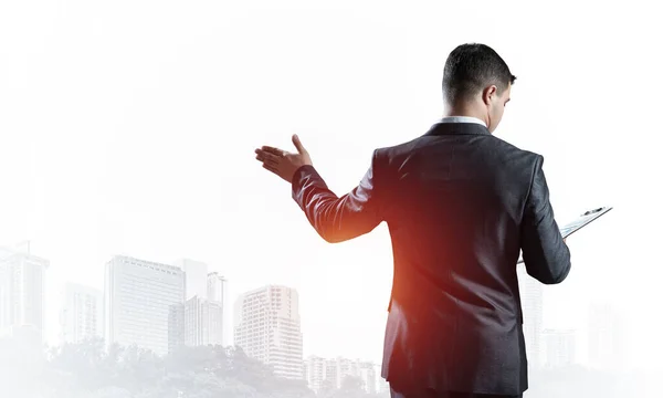 Back view of man in business suit and tie — Stock Photo, Image