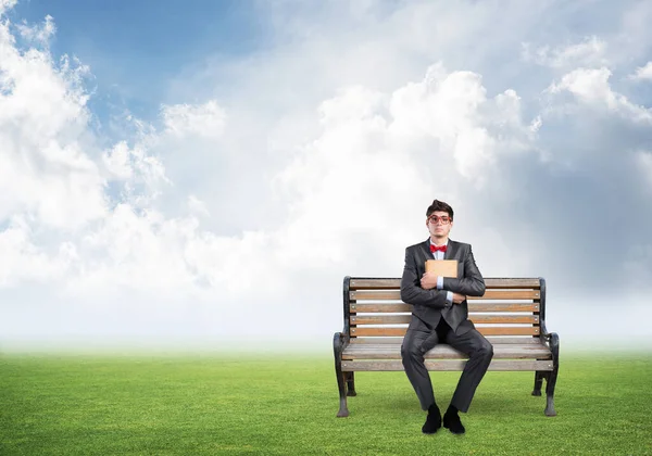 Young student with a book — Stock Photo, Image