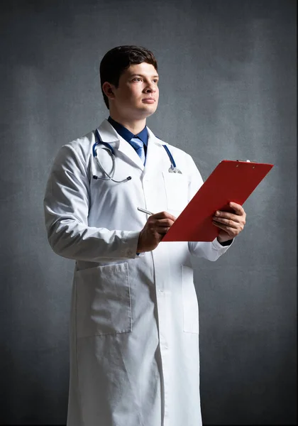 Doctor with tablet for documents — Stock Photo, Image