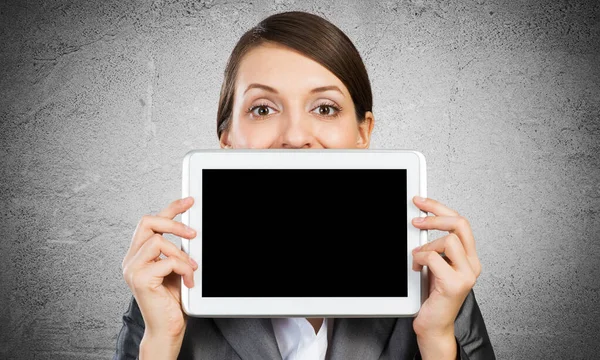 Businesswoman holding tablet computer layout — Stock Photo, Image