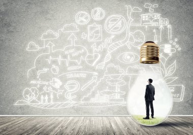 Ampulde sıkışan bir iş adamı