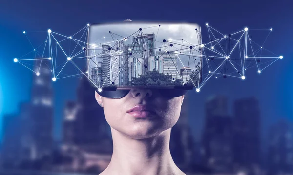 Young woman in VR goggles — Stock Photo, Image