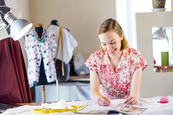 Needlewoman in studio working at order — Stock Photo, Image