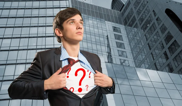 Businessman breaks the shirt — Stock Photo, Image