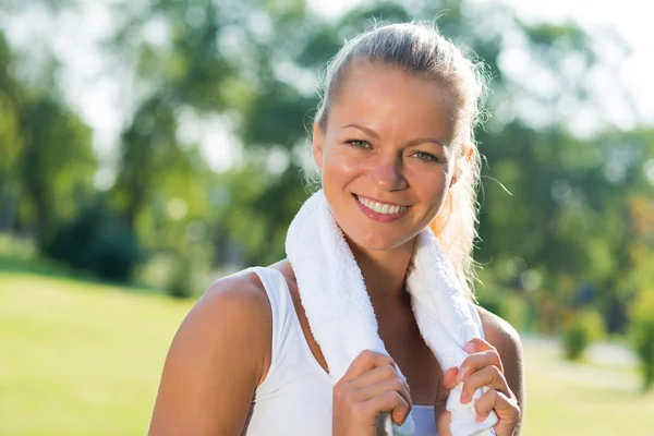 Attractive woman with a white towel — Stock Photo, Image