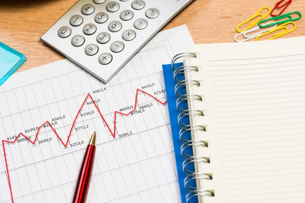 Pen, notebook and graph growth — Stock Photo, Image