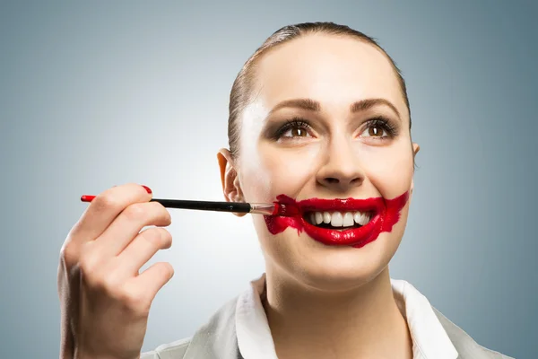 Young woman with vivid red mouth — Stock Photo, Image