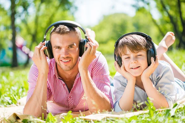 Father and son in park — Stock Photo, Image