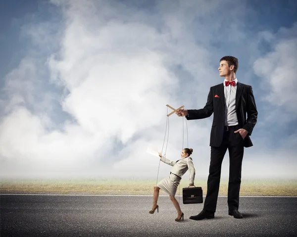 Puppeteer and business woman — Stock Photo, Image