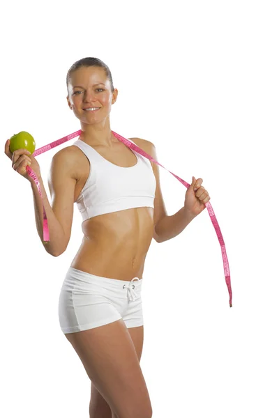 Young attractive woman with measuring tape — Stock Photo, Image