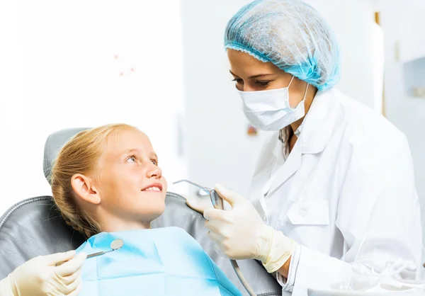 Dentist inspecting patient — Stock Photo, Image