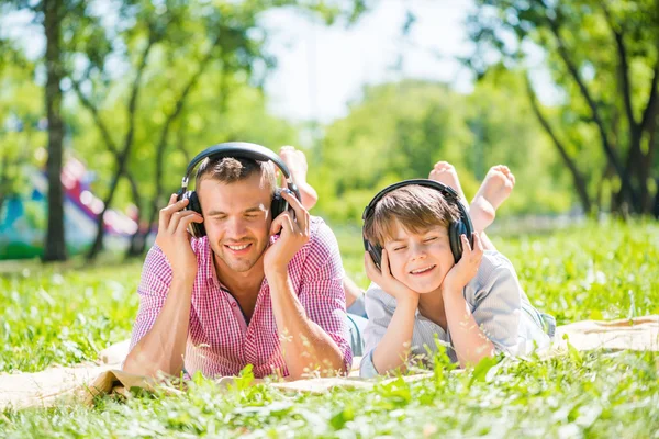 Father and son in park — Stock Photo, Image