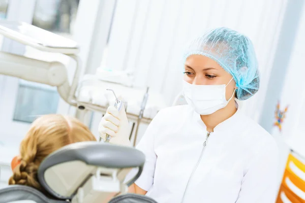 Dentist inspecting patient — Stock Photo, Image