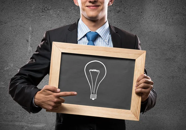 Businessman with frame — Stock Photo, Image