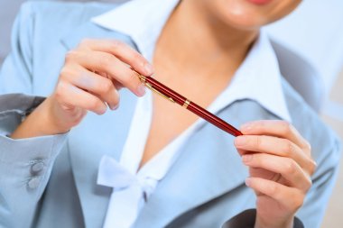 bir iş kadını elinde Close-Up