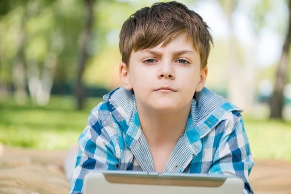 Boy in summer park — Stock Photo, Image