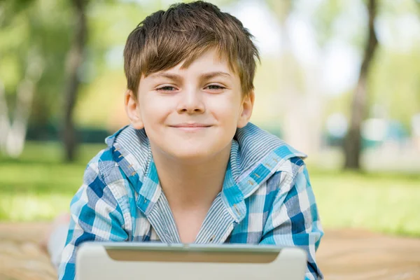 Boy in summer park — Stock Photo, Image