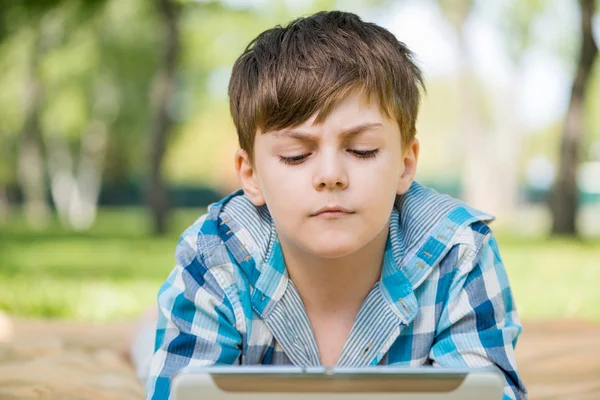 Boy in summer park — Stock Photo, Image