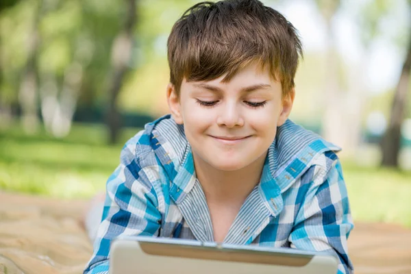 Boy in summer park — Stock Photo, Image