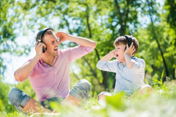 Father and son in park — Stock Photo, Image