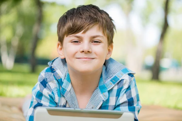 Boy in summer park — Stock Photo, Image