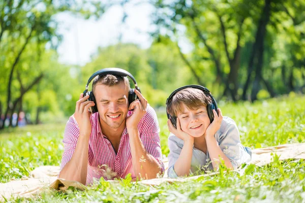 Father and son in park — Stock Photo, Image