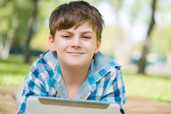 Boy in summer park — Stock Photo, Image