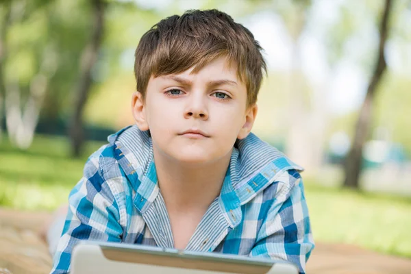 Boy in summer park — Stock Photo, Image