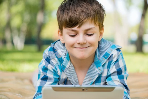 Boy in summer park — Stock Photo, Image