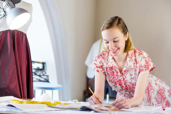 Young pretty needlewoman — Stock Photo, Image