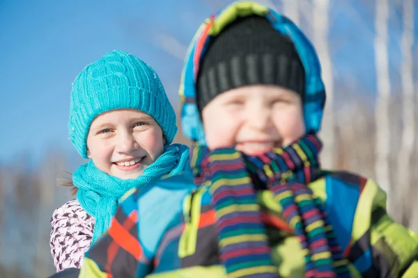 Two cute kids riding sled — Stock Photo, Image