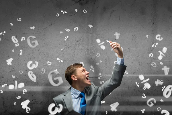 Businessman screaming in mobile phone — Stock Photo, Image