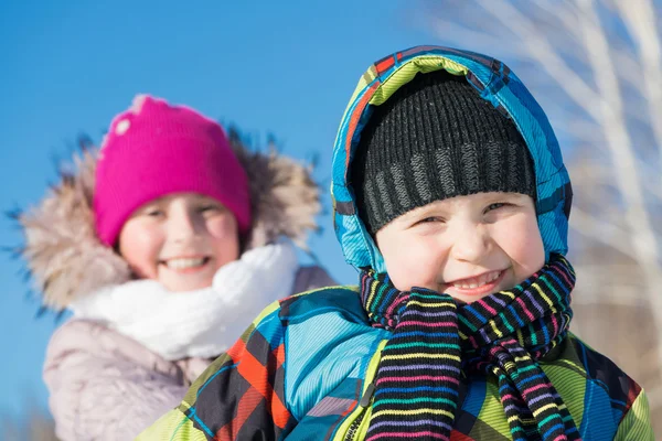 Two cute kids riding sled — Stock Photo, Image