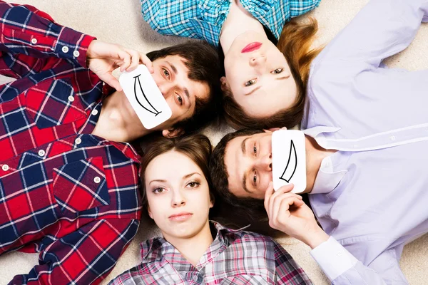 Four people lie together — Stock Photo, Image