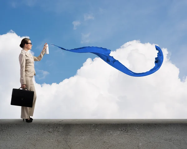 Young businesswoman with suitcase — Stock Photo, Image