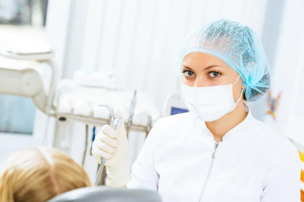 Dentist inspecting patient — Stock Photo, Image