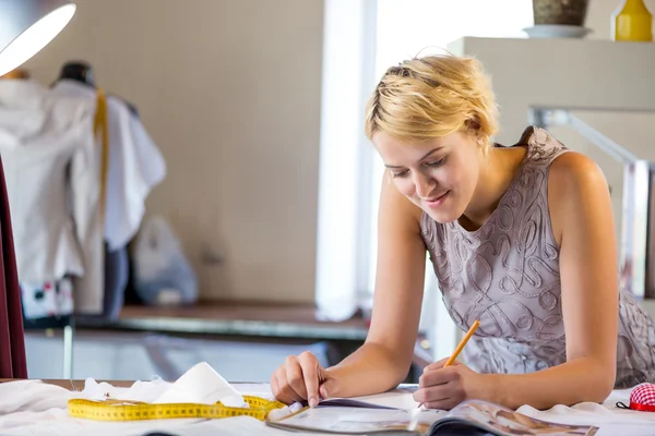 Young pretty needlewoman — Stock Photo, Image