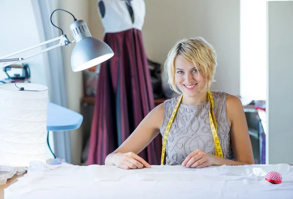 Young blonde needlewoman — Stock Photo, Image