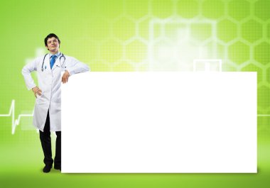 Bayrağı olan doktor.