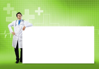 Bayrağı olan doktor.