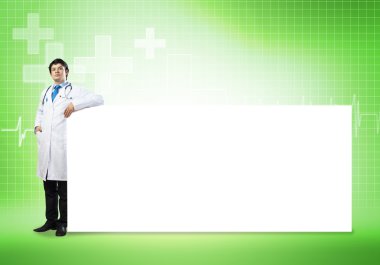 Bayrağı olan doktor.