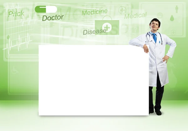 Doctor with banner — Stock Photo, Image