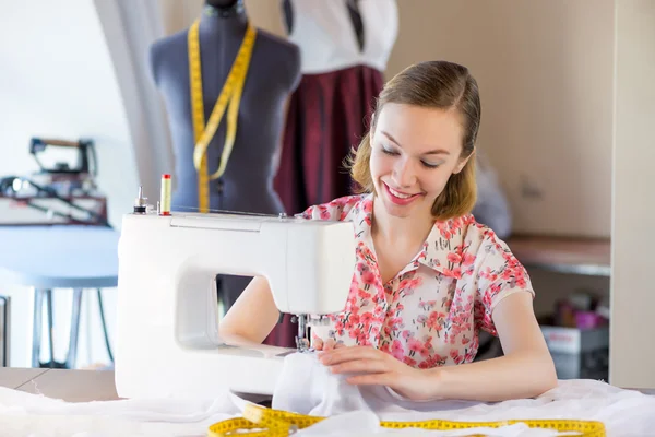 Young attractive needlewoman — Stock Photo, Image